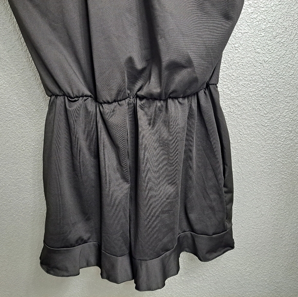 Black Romper With A Ruffled Short/Swimsuit - Picture 3 of 9